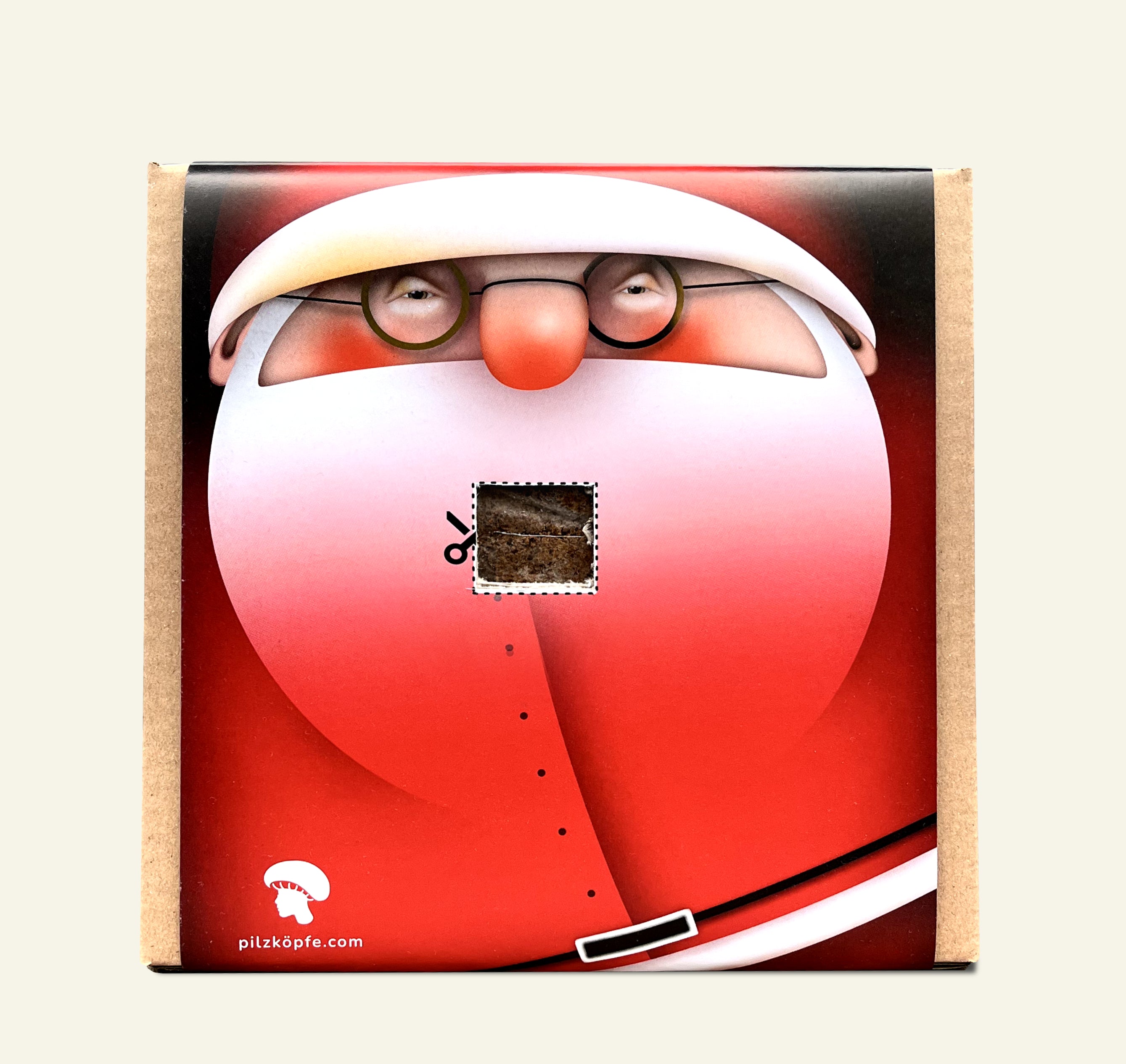 Pilz-Zucht-Set von Pilzköpfe mit Weihnachtsmann-Portrait. Sein Bart ist nur angedeutet. Durch eine eingeschnittene, rechteckige Öffnung im Karton wird bald der Pilz wachsen.